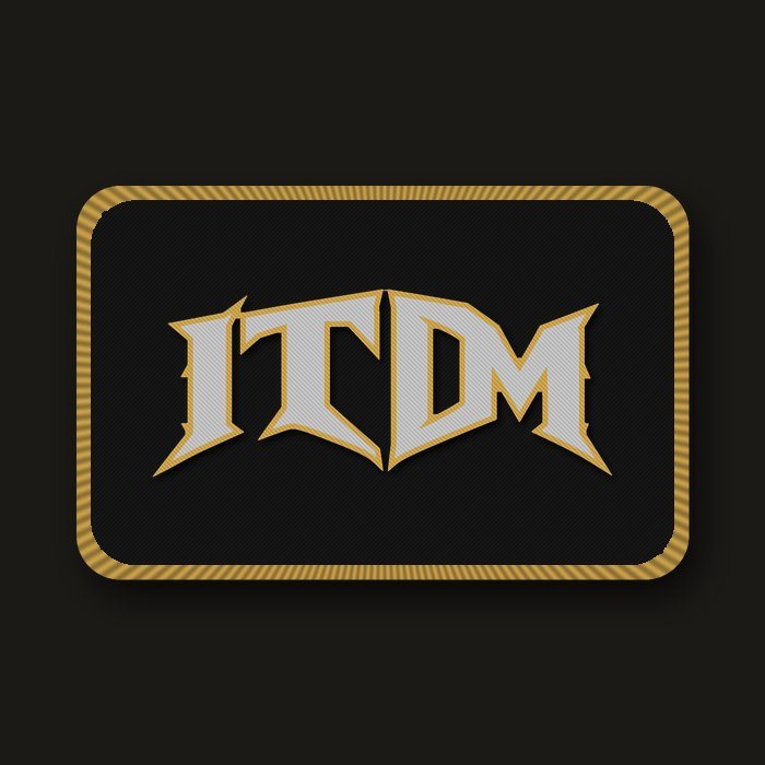 Rectangular black embroidered patch with gold and grey ITDM letters